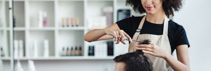 Barber cutting hair