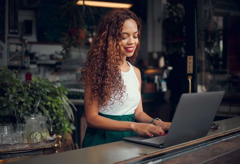 Manager working on laptop